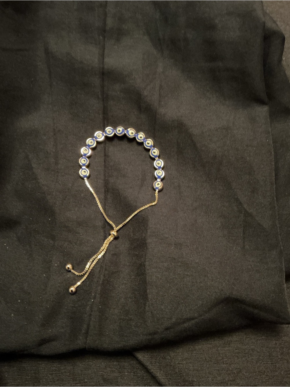 Adjustable Gold-Tone Bracelet with Blue Evil Eye Beads